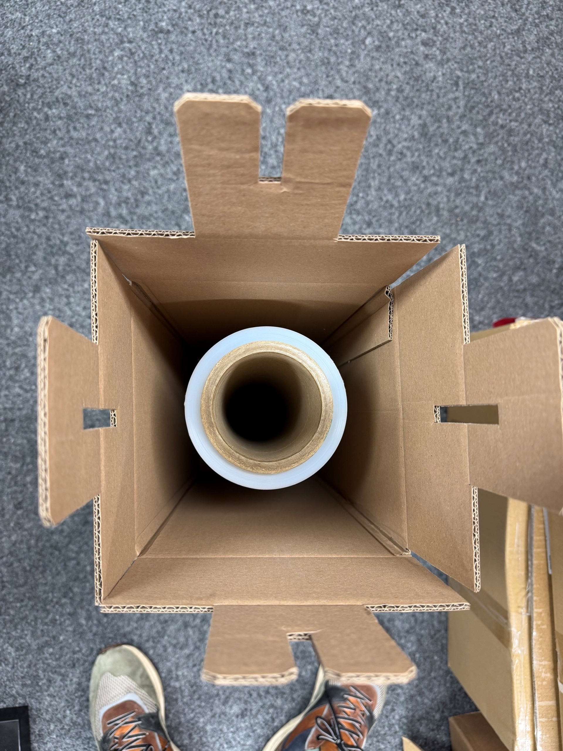 Wellpappen Verpackungen welche einen Kern fixieren